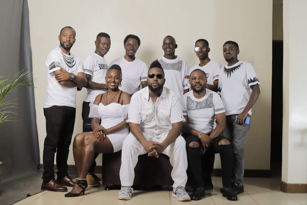 Tempra Omona now performs with his band. Here's the team!